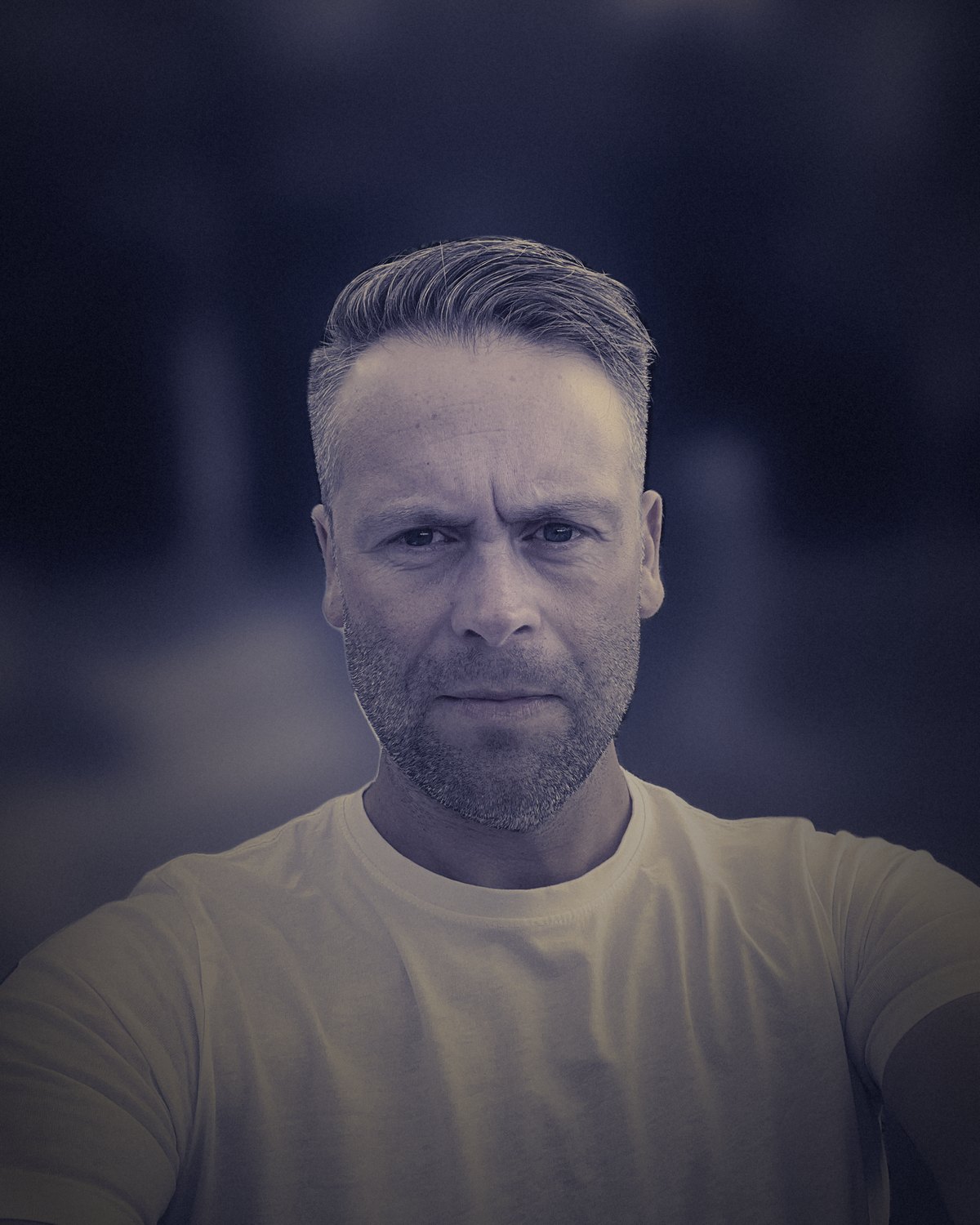 E.A. Marsh in a white t-shirt